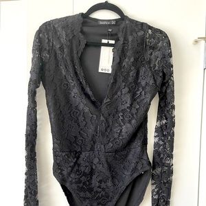 New! Plunge neck lace body suit. Scalloped neck line. Full length sleeves.